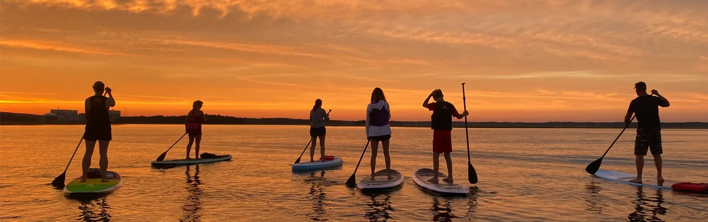 Paddleboarding at sunset on Lake Alfred's chain of lakes