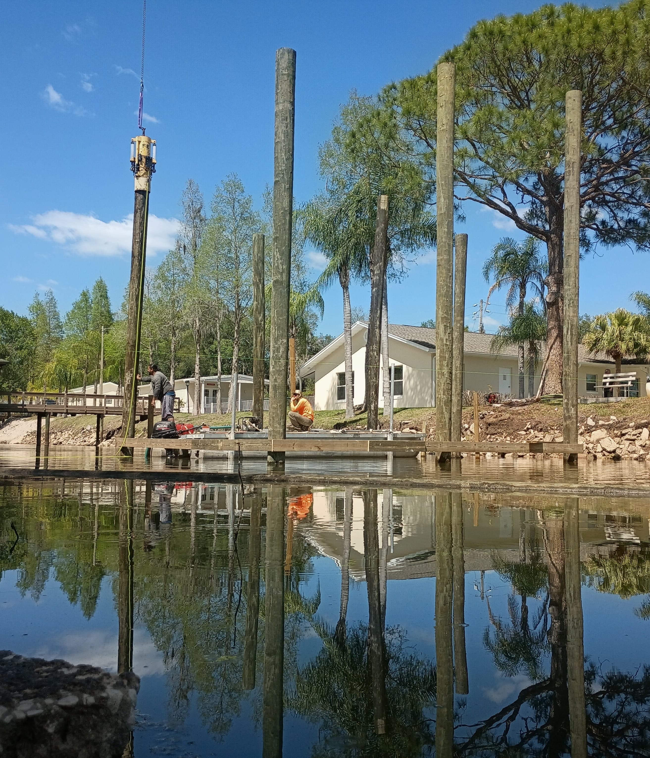 Dock pilings on a Polk County lake — Horizon Marine