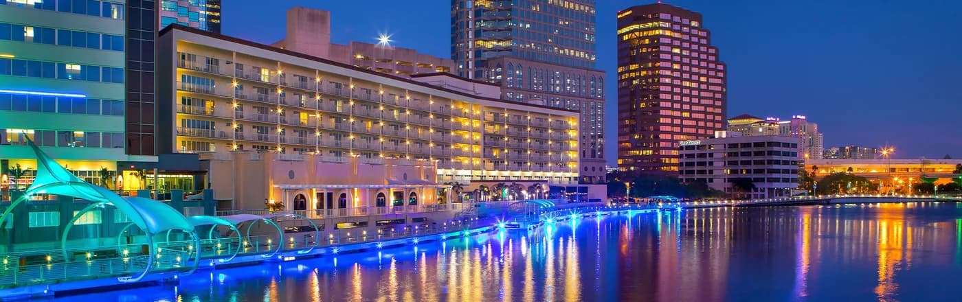 Downtown Tampa and the Riverwalk reflected in the Hillsborough River at dusk