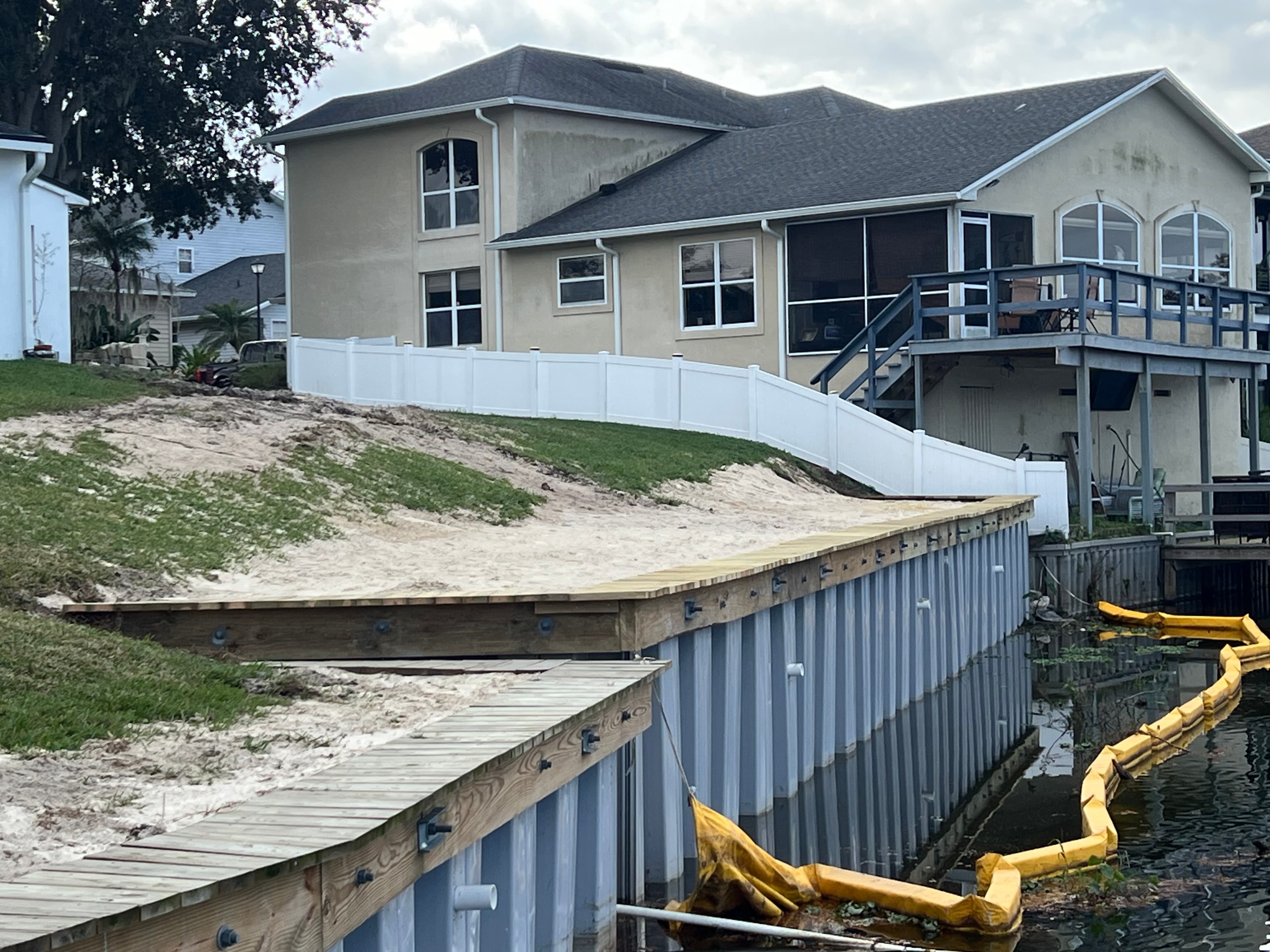 New Seawall with Cap and Silt Barrier — Central Florida